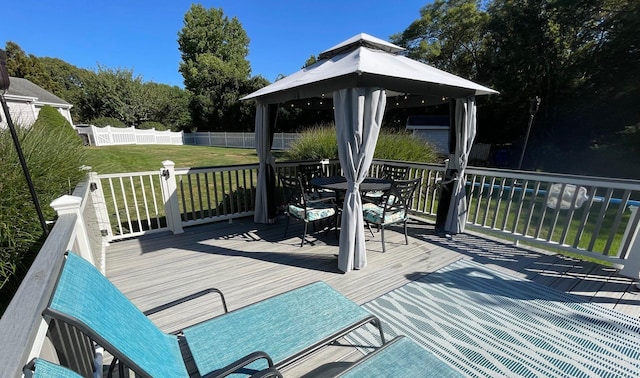 43 Southfield Rd, Baiting Hollow, NY 11933 - wooden deck featuring a fenced backyard, a gazebo, and outdoor dining space