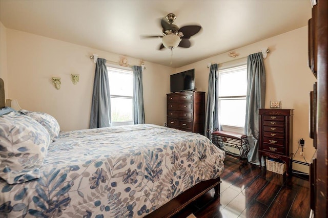 25 December Walk, Long Beach, NY 11561 - bedroom featuring multiple windows, a ceiling fan, and dark wood-type flooring