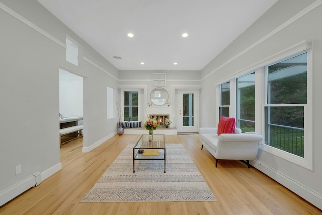 31 Pierce Dr, Pleasantville, NY 10570 - living area with baseboard heating, light wood-style flooring, a baseboard radiator, and recessed lighting