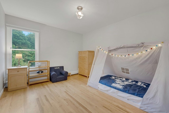 31 Pierce Dr, Pleasantville, NY 10570 - bedroom with light wood-style floors and baseboards