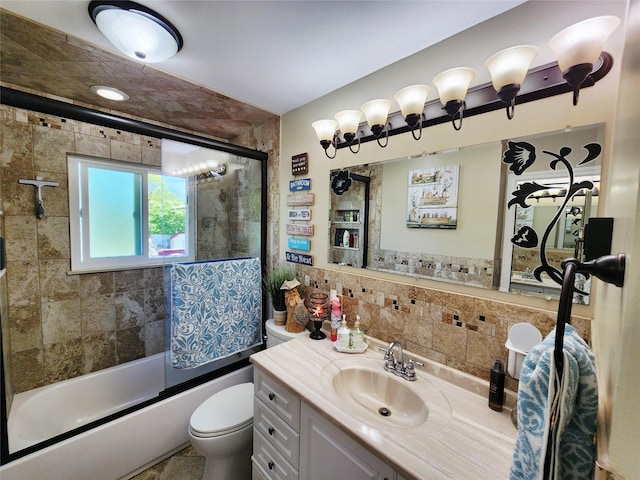373 Commack Rd, Islip, NY 11751 - full bathroom with vanity, bath / shower combo with glass door, and tile walls