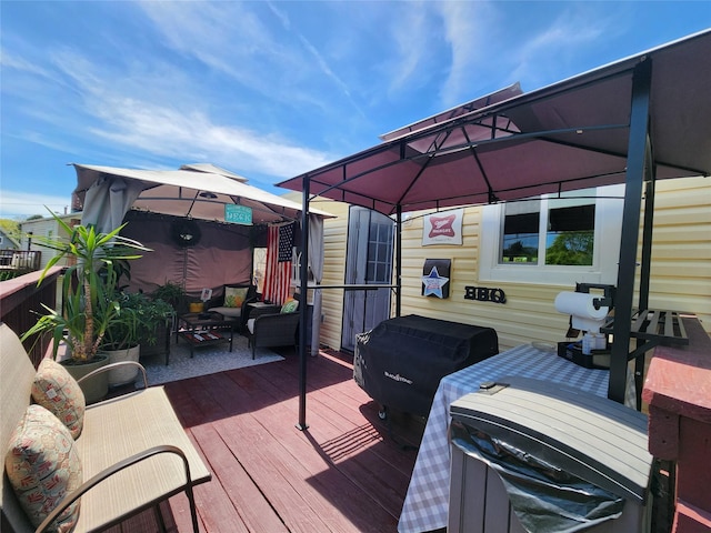 373 Commack Rd, Islip, NY 11751 - wooden terrace with a gazebo, grilling area, and outdoor lounge area