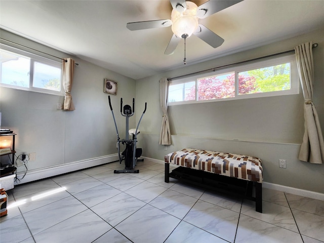 373 Commack Rd, Islip, NY 11751 - exercise room with plenty of natural light, a baseboard heating unit, and ceiling fan
