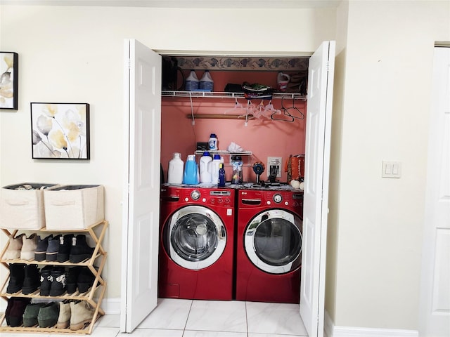 373 Commack Rd, Islip, NY 11751 - laundry area featuring washing machine and clothes dryer and baseboards