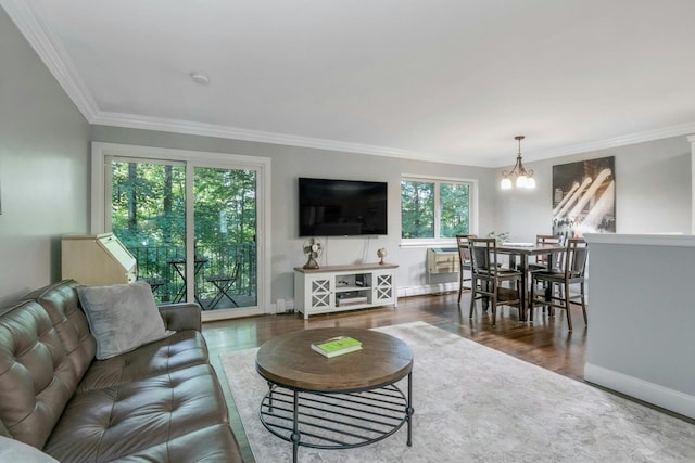 13 Scenic Dr Unit D, Croton-On-Hudson, NY 10520 - living area featuring crown molding, a chandelier, and wood finished floors