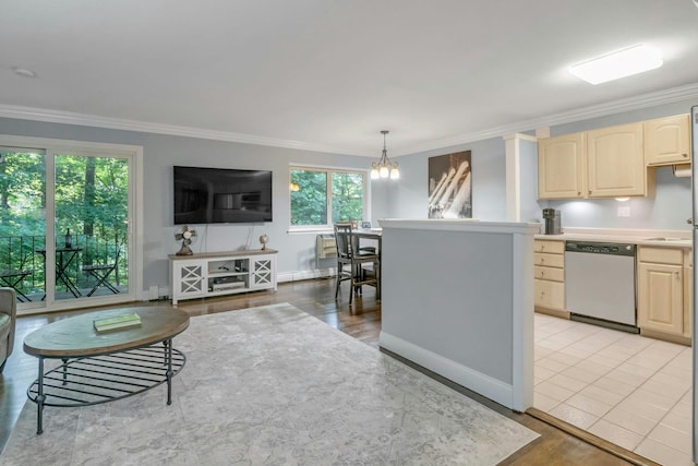 13 Scenic Dr Unit D, Croton-On-Hudson, NY 10520 - kitchen featuring dishwasher, light brown cabinets, ornamental molding, a chandelier, and healthy amount of natural light