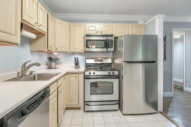 13 Scenic Dr Unit D, Croton-On-Hudson, NY 10520 - kitchen featuring stainless steel appliances, light brown cabinets, light countertops, and ornamental molding