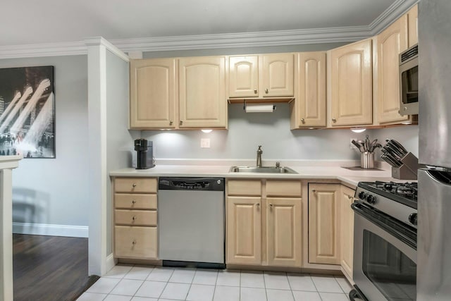 13 Scenic Dr Unit D, Croton-On-Hudson, NY 10520 - kitchen featuring appliances with stainless steel finishes, light brown cabinetry, light countertops, ornamental molding, and light tile patterned flooring