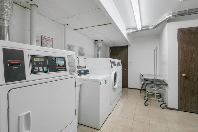 13 Scenic Dr Unit D, Croton-On-Hudson, NY 10520 - community laundry room featuring washing machine and clothes dryer and baseboards