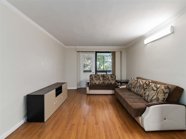 61-25 98th St Unit 2H, Rego Park, NY 11374 - living area with light wood-style flooring and crown molding