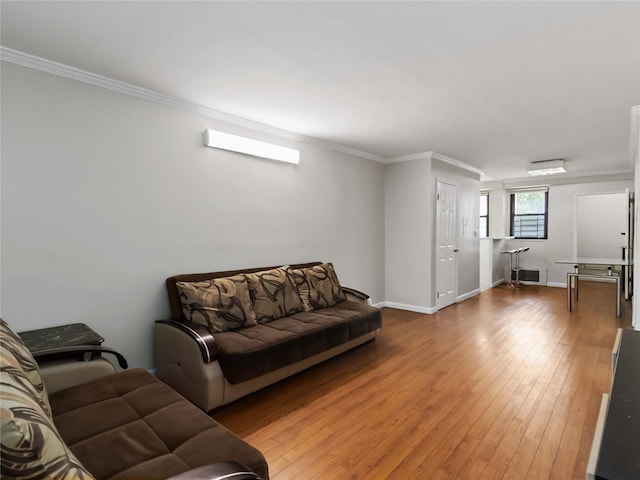 61-25 98th St Unit 2H, Rego Park, NY 11374 - living area with ornamental molding and light wood-style floors