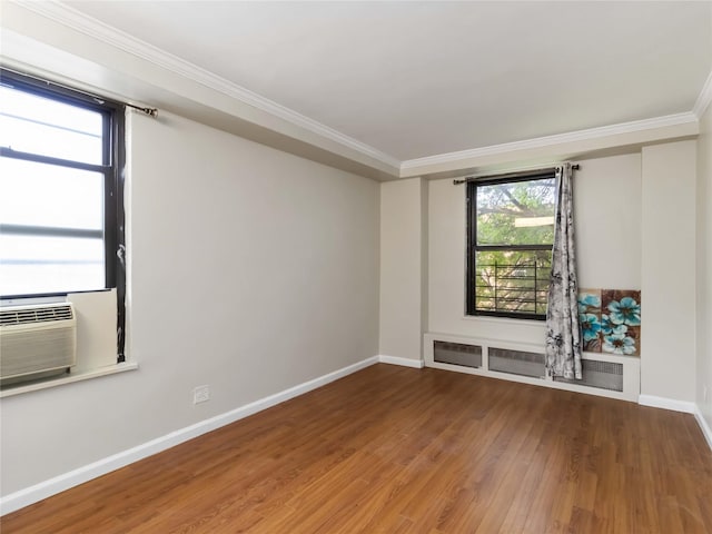 61-25 98th St Unit 2H, Rego Park, NY 11374 - unfurnished room featuring wood finished floors, crown molding, and cooling unit
