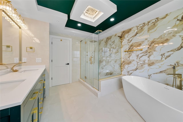 71 Cedar St, Hicksville, NY 11801 - bathroom with a marble finish shower, a freestanding bath, double vanity, a raised ceiling, and recessed lighting