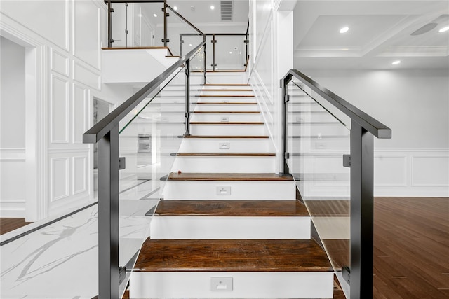 71 Cedar St, Hicksville, NY 11801 - stairs with a decorative wall, wood finished floors, ornamental molding, recessed lighting, and wainscoting