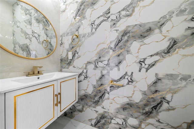 71 Cedar St, Hicksville, NY 11801 - bathroom with vanity and marble tiled flooring