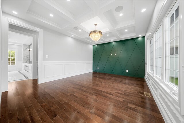 71 Cedar St, Hicksville, NY 11801 - unfurnished room with a decorative wall, dark wood-style floors, a chandelier, beamed ceiling, and coffered ceiling