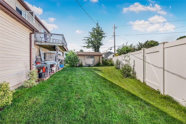 99 Stone Ln, Levittown, NY 11756 - fenced backyard featuring a wooden deck