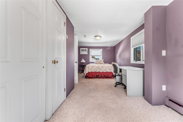 99 Stone Ln, Levittown, NY 11756 - bedroom with baseboard heating, an office area, carpet flooring, and an AC wall unit