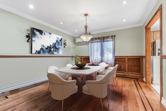 99 Stone Ln, Levittown, NY 11756 - dining area featuring light wood-style floors, an AC wall unit, recessed lighting, and crown molding