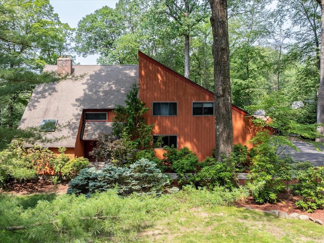 35 David Rd, Somers, NY 10589 - view of property exterior featuring a chimney and a shingled roof