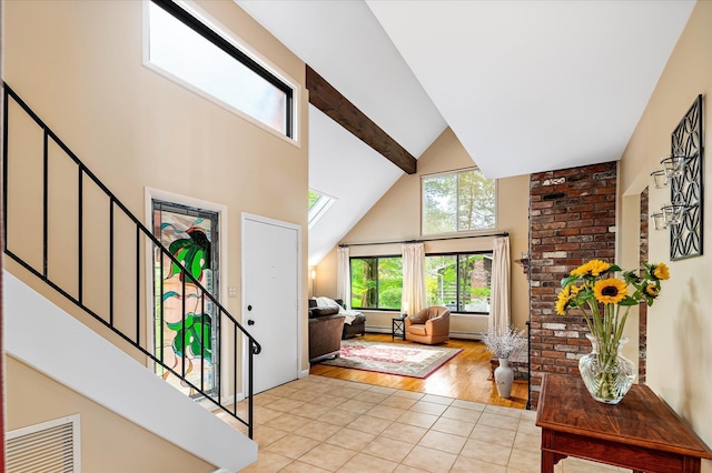 35 David Rd, Somers, NY 10589 - entryway featuring high vaulted ceiling, light tile patterned floors, stairway, and beamed ceiling