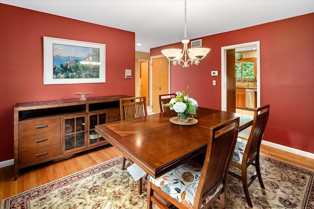 35 David Rd, Somers, NY 10589 - dining space with a chandelier and light wood-style floors