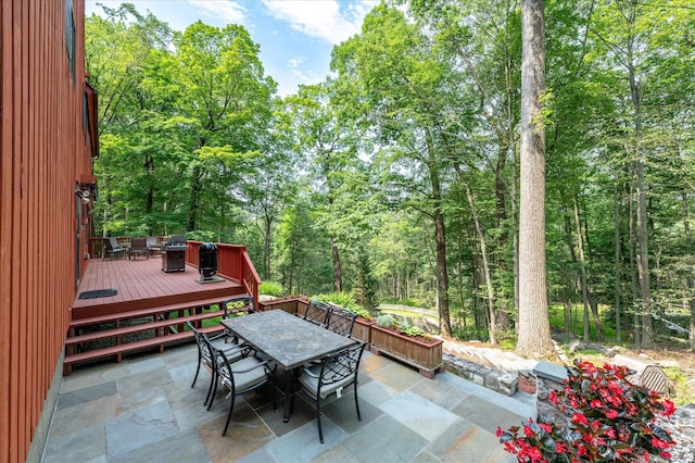 35 David Rd, Somers, NY 10589 - view of patio / terrace with outdoor dining space, a deck, a grill, and a forest view