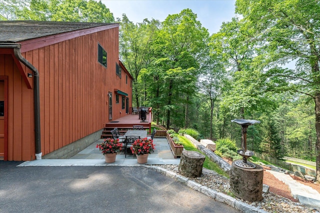 35 David Rd, Somers, NY 10589 - view of side of home featuring a patio area, a deck, and outdoor dining space