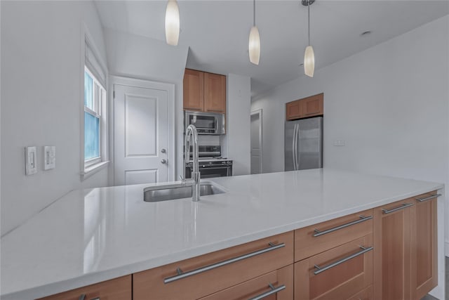 20 Fairmount Blvd, Garden City, NY 11530 - kitchen with appliances with stainless steel finishes, brown cabinetry, light countertops, and pendant lighting