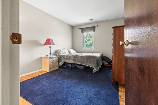 61 Sherwood Ct, Huntington, NY 11743 - bedroom with wood finished floors