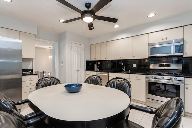 9 Westlyn Dr, Bardonia, NY 10954 - dining area featuring ceiling fan, recessed lighting, and light tile patterned floors