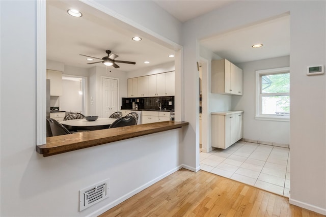 9 Westlyn Dr, Bardonia, NY 10954 - kitchen featuring recessed lighting, wood counters, a ceiling fan, light wood finished floors, and backsplash