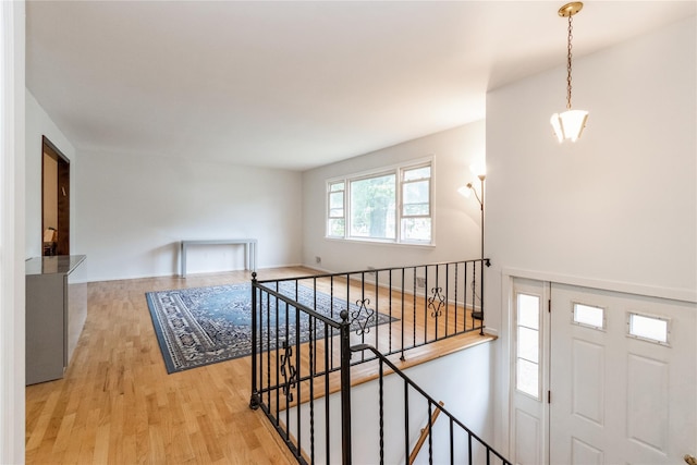 9 Westlyn Dr, Bardonia, NY 10954 - hall featuring light wood-style floors and an upstairs landing