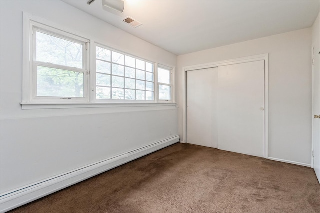 9 Westlyn Dr, Bardonia, NY 10954 - unfurnished bedroom with a baseboard heating unit, carpet flooring, and a closet