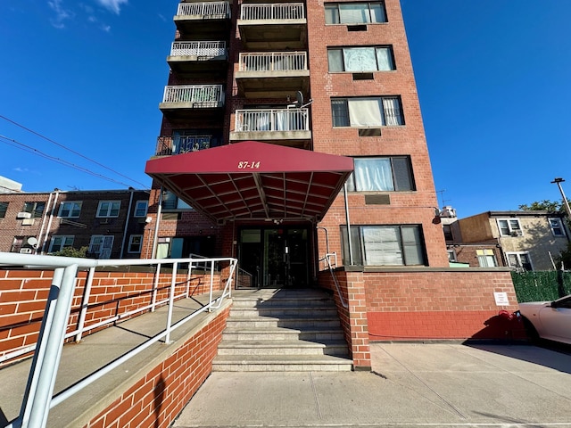87-14 57th Rd Unit 1A, Elmhurst, NY 11373 - view of apartment building / complex