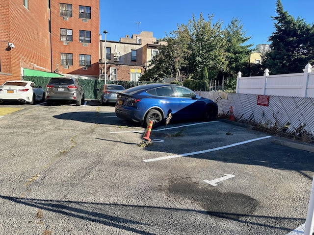 87-14 57th Rd Unit 1A, Elmhurst, NY 11373 - view of uncovered parking lot