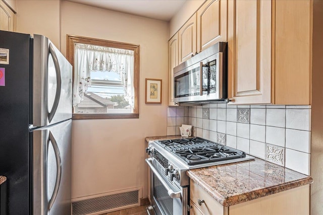 163-50 25th Dr, Flushing, NY 11358 - kitchen with appliances with stainless steel finishes, backsplash, and light brown cabinetry