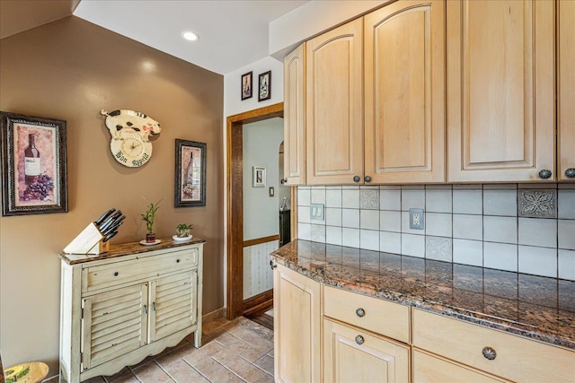 163-50 25th Dr, Flushing, NY 11358 - kitchen with light brown cabinets, tasteful backsplash, dark stone countertops, recessed lighting, and light stone finish floors