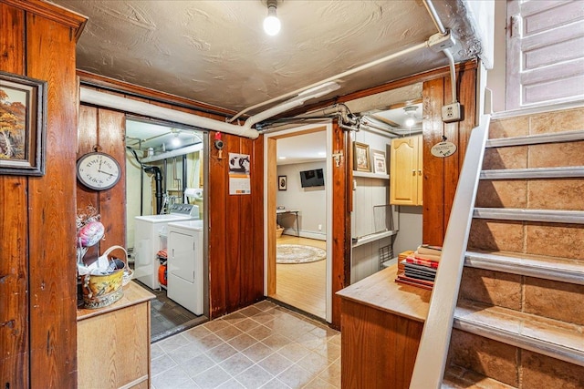 163-50 25th Dr, Flushing, NY 11358 - finished below grade area featuring independent washer and dryer, baseboard heating, and stairway
