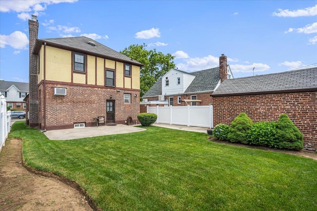 163-50 25th Dr, Flushing, NY 11358 - back of property featuring brick siding, a chimney, a patio, and stucco siding