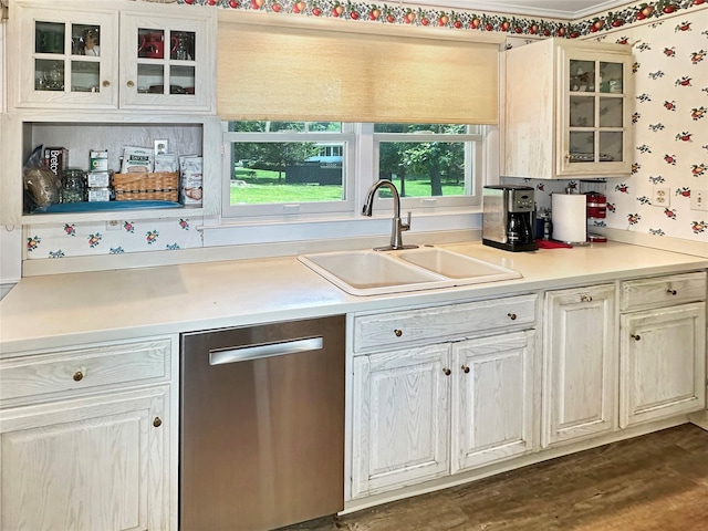 222 Beechwood Ave, Poughkeepsie, NY 12601 - kitchen featuring stainless steel dishwasher, wallpapered walls, glass insert cabinets, light countertops, and ornamental molding