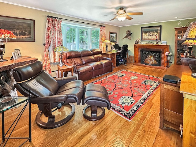222 Beechwood Ave, Poughkeepsie, NY 12601 - living room featuring wood finished floors, a ceiling fan, ornamental molding, a brick fireplace, and recessed lighting