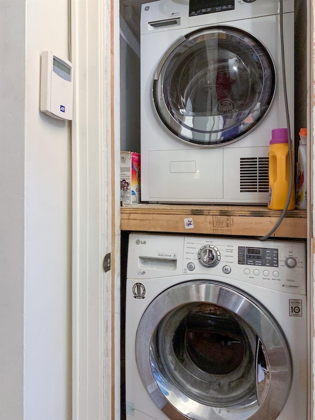 4204 64th St, Woodside, NY 11377 - washroom with stacked washer / dryer