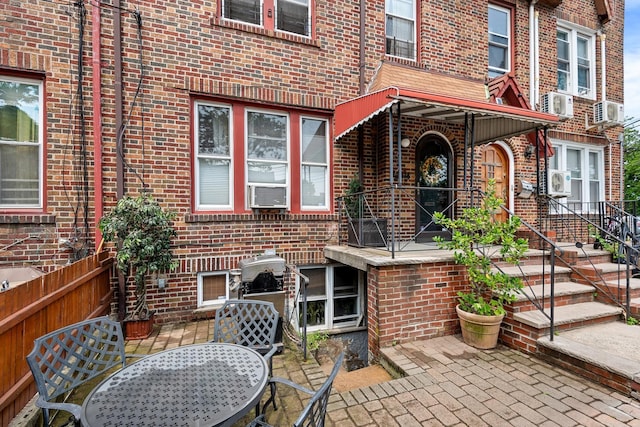 4204 64th St, Woodside, NY 11377 - view of patio featuring outdoor dining space and cooling unit