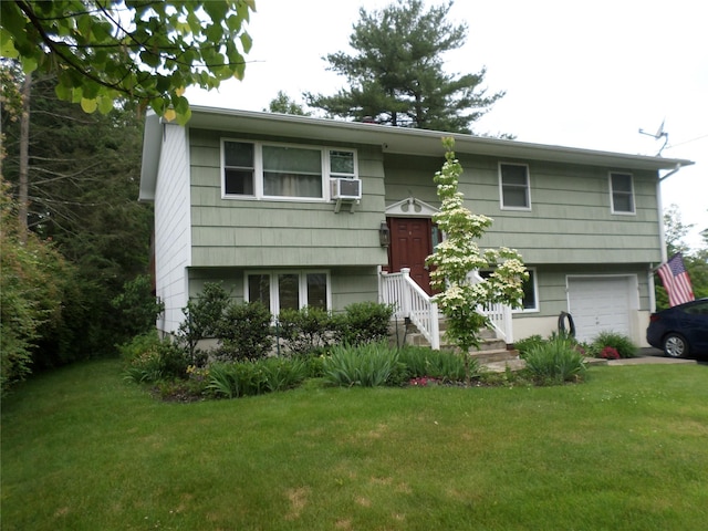 6 Kingsville Dr, Monroe, NY 10950 - split foyer home featuring an attached garage, a front lawn, and cooling unit