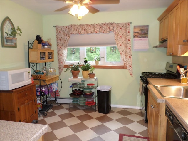 6 Kingsville Dr, Monroe, NY 10950 - kitchen featuring white microwave, light floors, under cabinet range hood, stainless steel gas range oven, and dishwasher