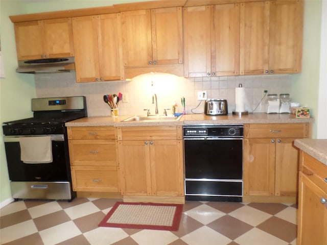 6 Kingsville Dr, Monroe, NY 10950 - kitchen featuring stainless steel gas range oven, black dishwasher, light flooring, under cabinet range hood, and light countertops