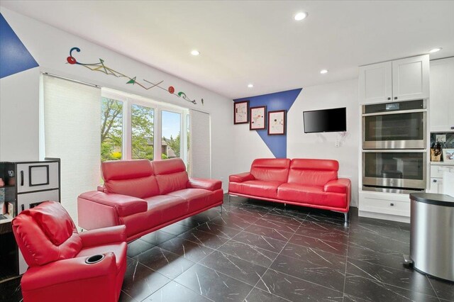 740 Eagle Dr, North Woodmere, NY 11581 - living room featuring marble tiled floors and recessed lighting