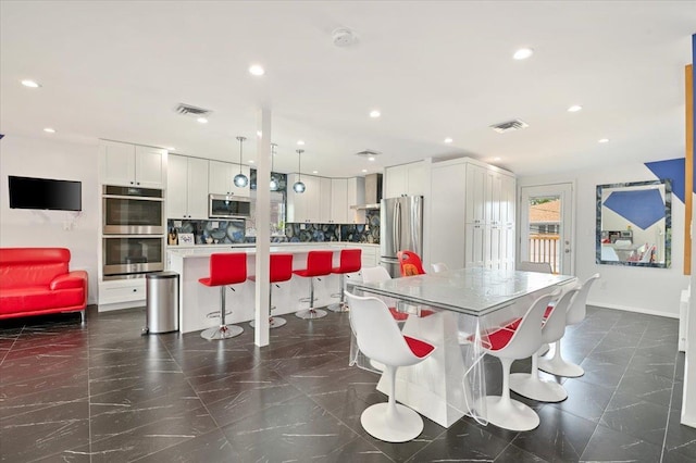 740 Eagle Dr, North Woodmere, NY 11581 - dining space featuring recessed lighting