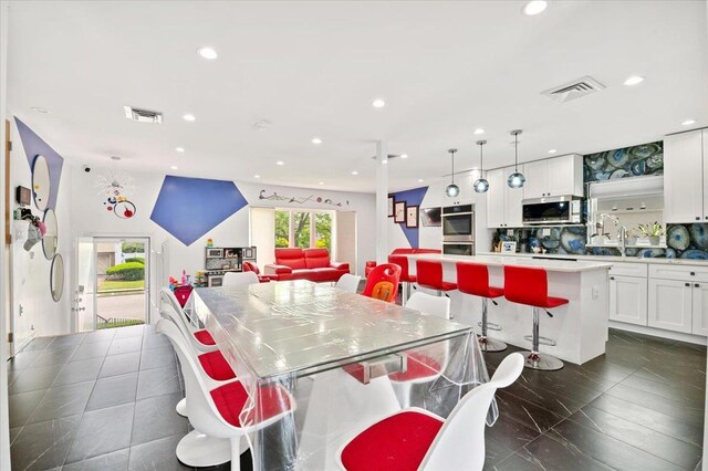740 Eagle Dr, North Woodmere, NY 11581 - dining area with recessed lighting